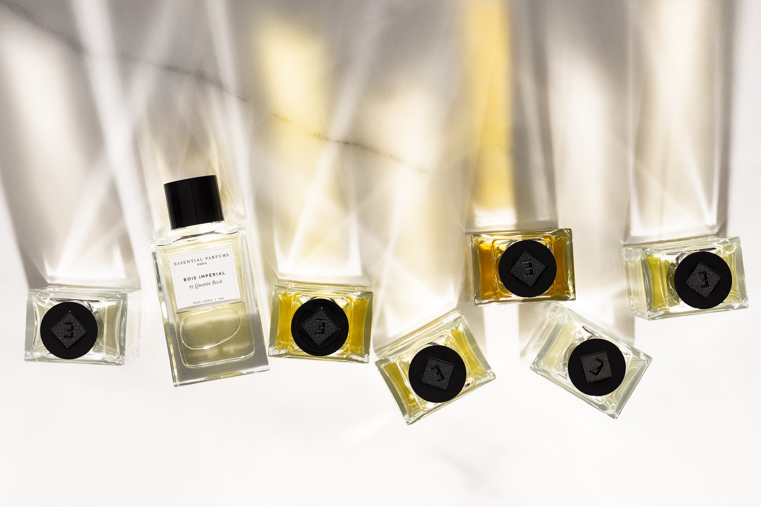 Lifestyle shot top view of Essential Parfums fragrances