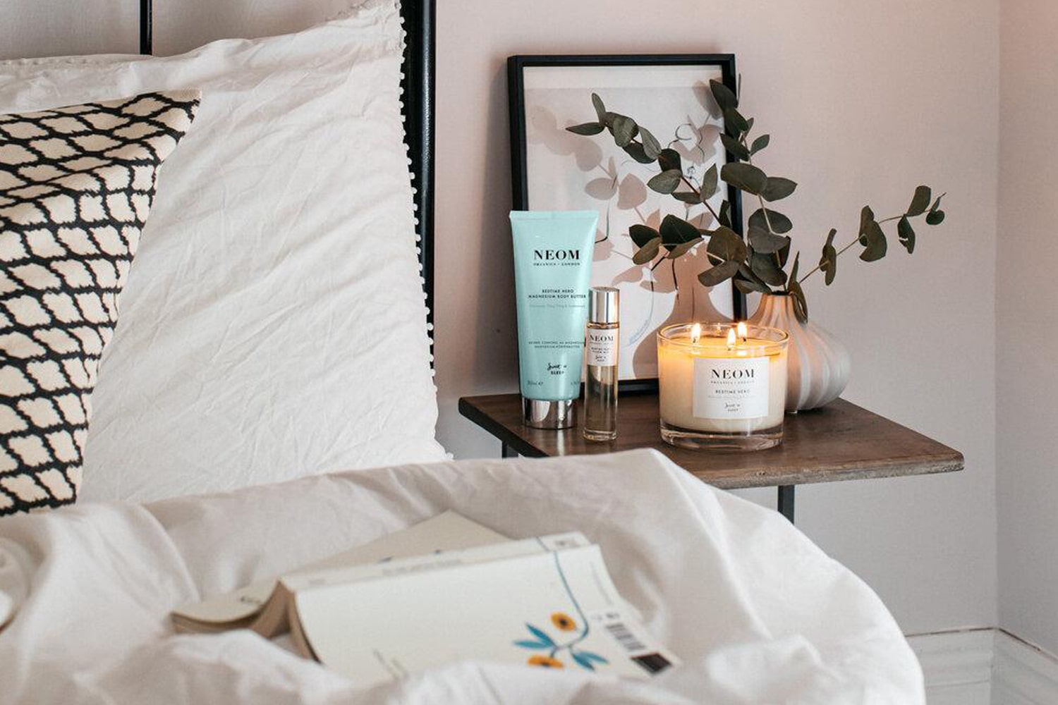 Lifestyle shot showing a selection of NEOM Organics products