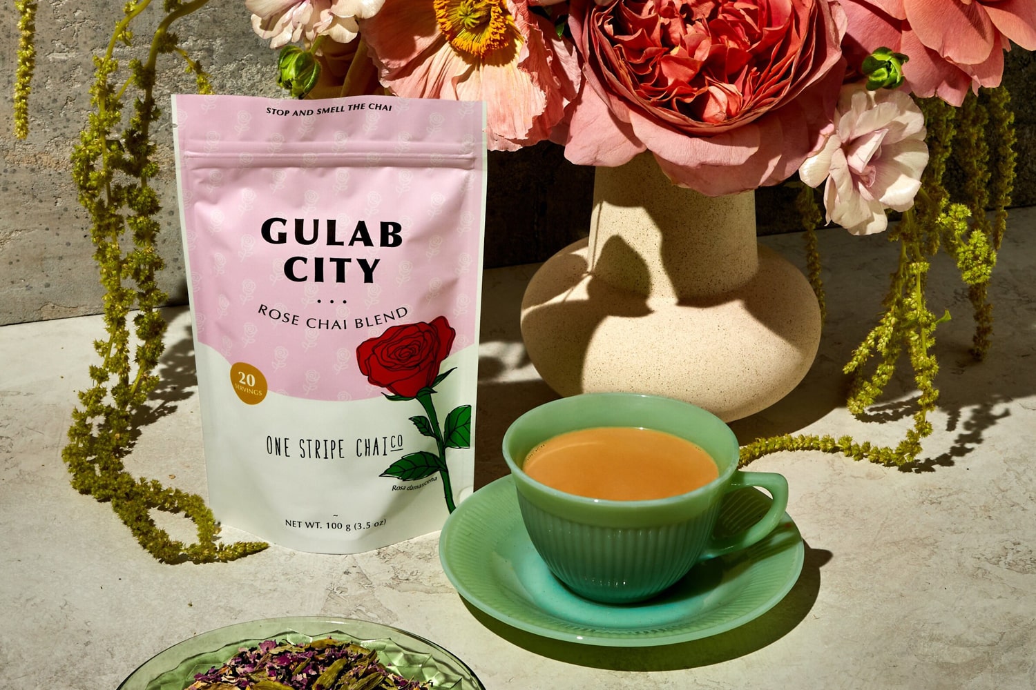 Lifestyle shot of One Stripe Chai Co. Gulab City Rose Chai Blend Tea