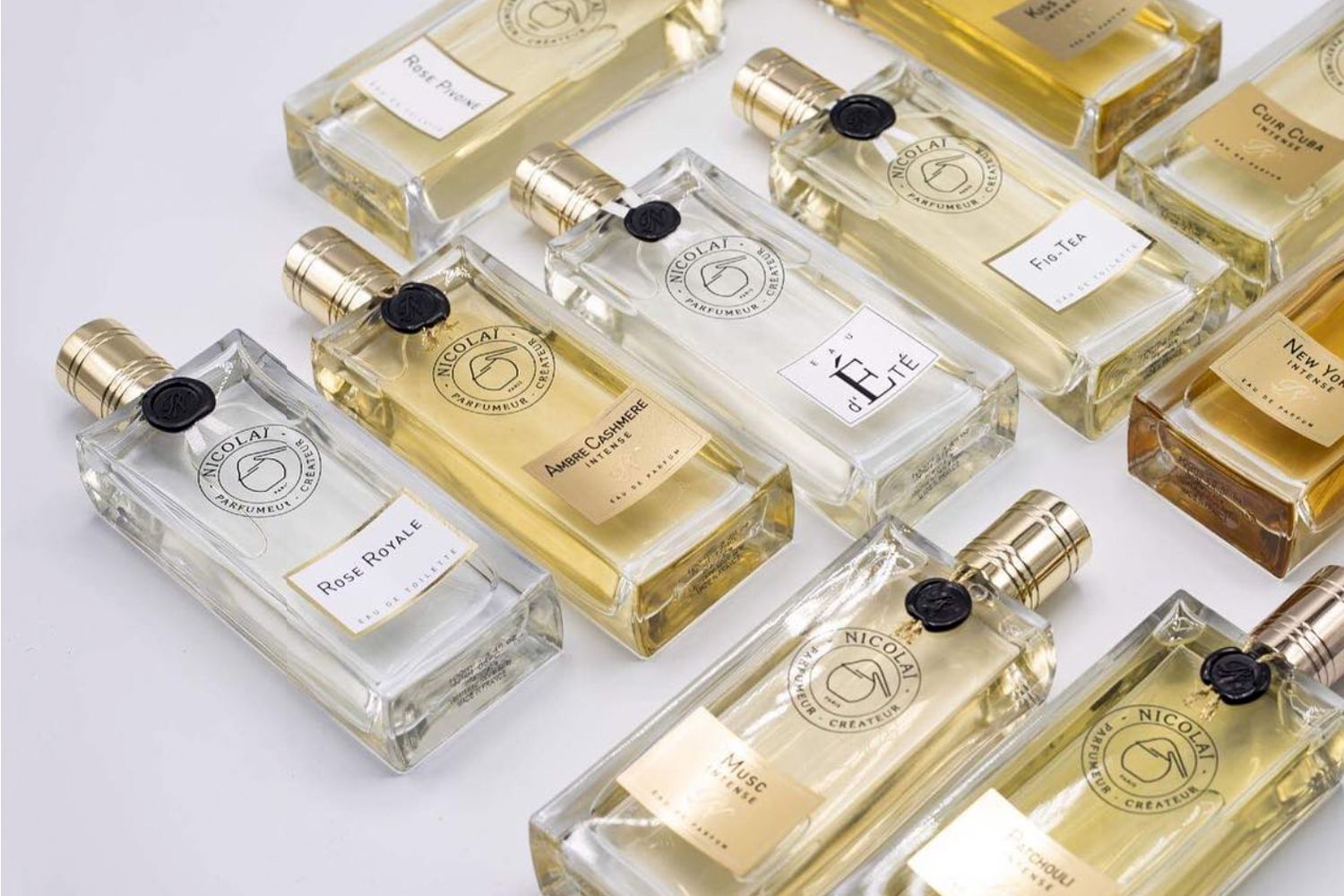 A selection of Parfums de Nicolai fragrances shown flat, top view