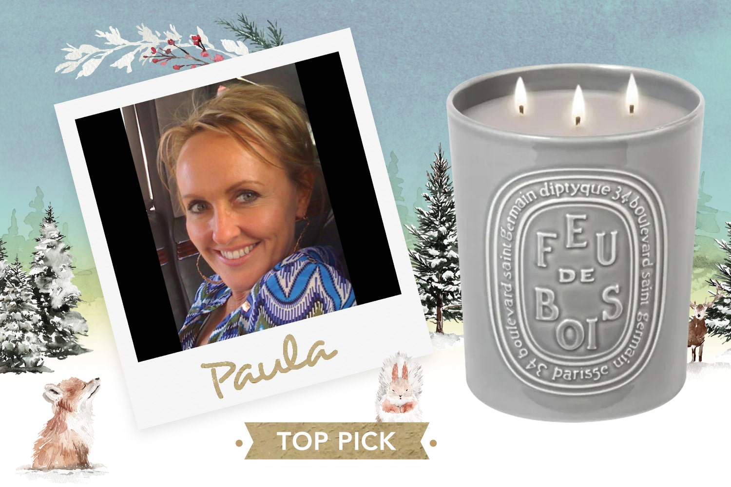 Polaroid picture of staff member Paula with seasonal art in background and her top pick product: Diptyque Feu De Bois Candle