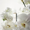 Kai Fragrance Perfume Oil Roll On (1/8 oz) - product shown with white flowers on a light background