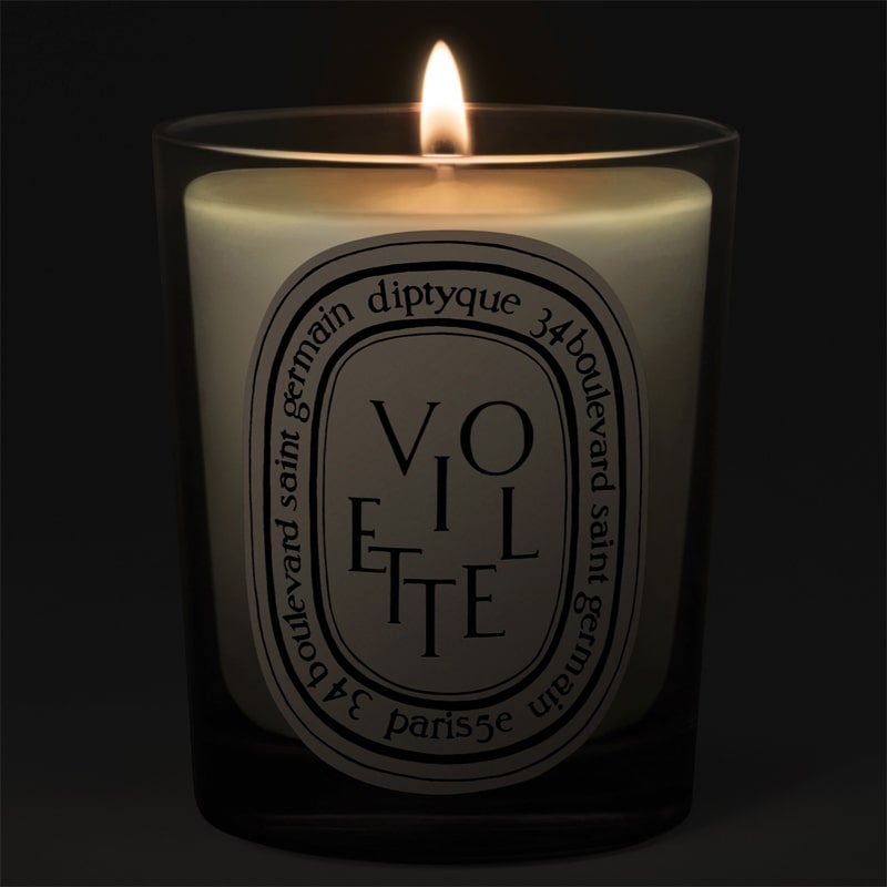 Diptyque Violette Candle - candle shown lit