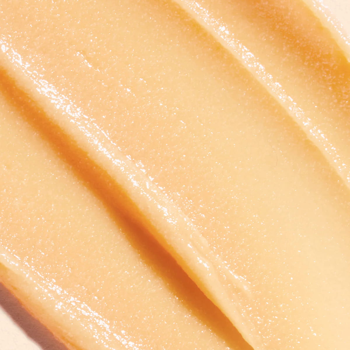 Nuxe Reve de Miel Lip Balm product swatch showing textture and color