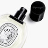 Diptyque Do Son Eau de Toilette (50 ml) - product shown on side with lid off. 