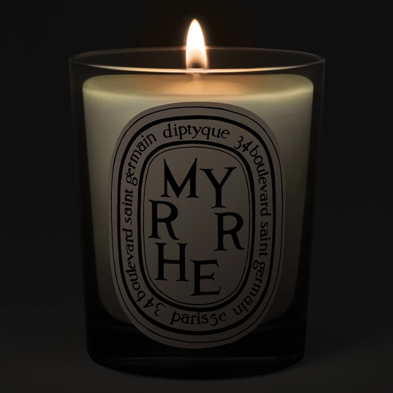 Diptyque Myrrhe (Myrrh) Candle - candle shown lit