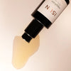 Close up of  ISUN Sapphire Facial Oil Moisturizer (30 ml) showing product swatch