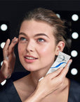 Embryolisse Lait Creme Concentre - model using lotion on face