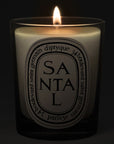 Diptyque Santal (Sandalwood) Candle - lit candle shown
