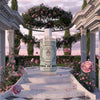 Lifestyle shot of Santa Maria Novella Rose Water (250 ml) in a rose garden with a column lined staircase