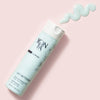 Top view of Yon-Ka Paris Lait Nettoyant (200 ml) with product smear to show pale blue color and texture of product