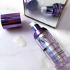 Yon-Ka Paris Cellular Code Serum (30 ml) shown top view with cap off and product smear on vanity table top to show product color and texture