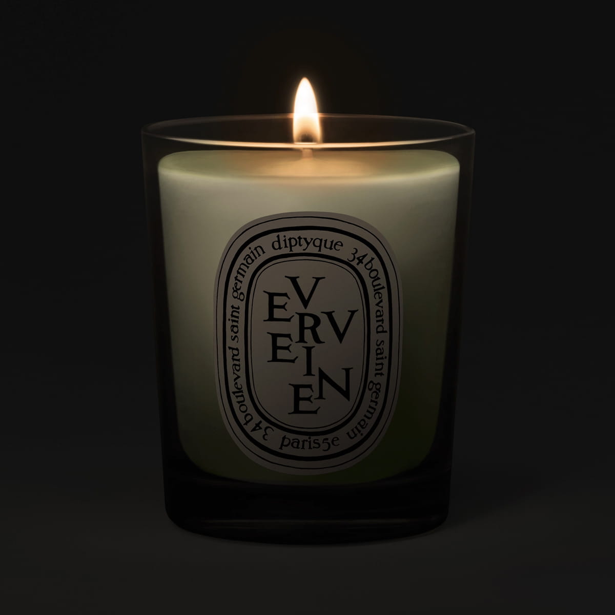 Diptyque Verveine (Lemon Verbena) Candle (70 g) shown lit
