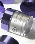 Yon-Ka Paris Excellence Code Creme (50 ml) shown on its side with tops of otherYon-Ka Paris Excellence Code Creme in the background