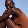 Model shown with Nuxe Prodigieuse Beautifying Scented Body Lotion applied to arms and legs