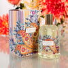 Fragonard Parfumeur Fragonard Eau de Toilette (100 ml) with box with flowers in the background