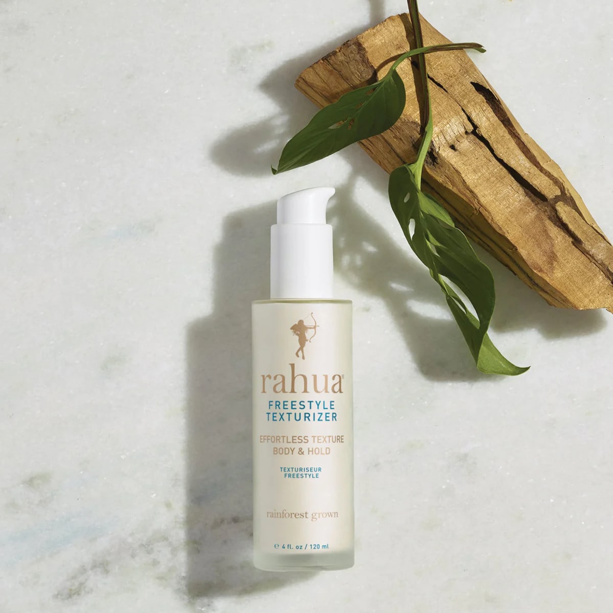 Rahua by Amazon Beauty Rahua Freestyle Texturizer  (120 ml) - product shown next to plant and wood piece
