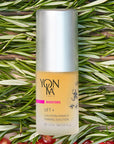 Yon-Ka Paris Lift + Firming Solution (15 ml) shown top view with rosemary in the background