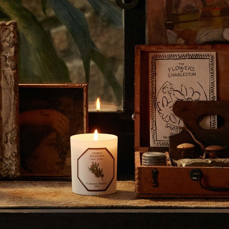 Lifestyle shot of Carriere Freres Cedar Candle (185 g) shown lit