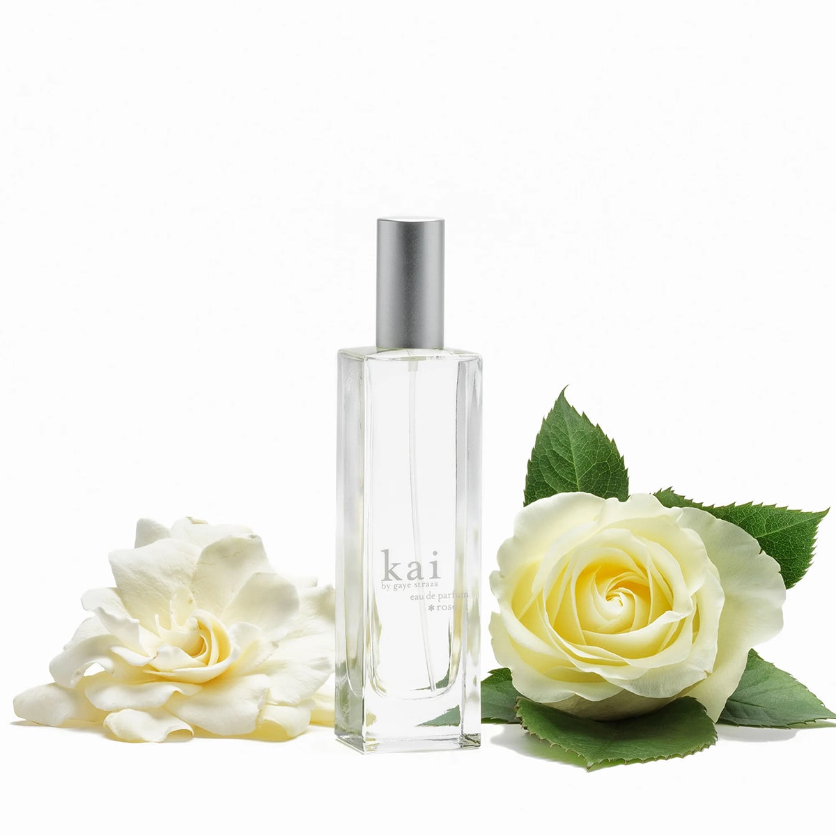 Kai Fragrance Kai Rose Eau de Parfum Spray (1.7 oz) with two white roses on a white background