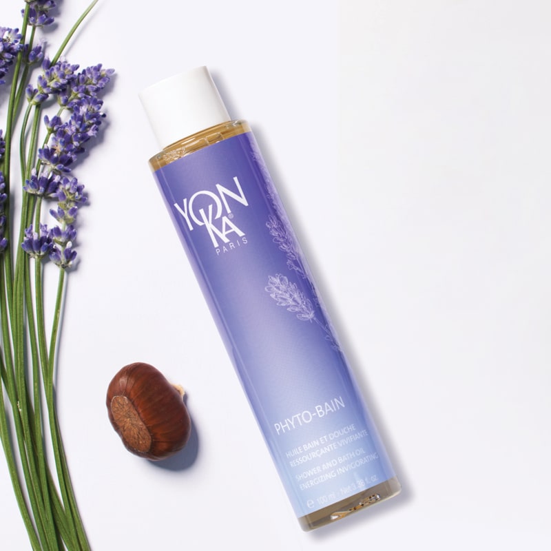 Top view of Yon-Ka Paris Phyto-Bain - Detox Lavender (100 ml) with lavender and nut in the background