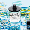 D.S. & Durga I Don't Know What Eau de Parfum (50 ml) with colorful rubber bands on a blue background