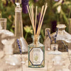 Lifestyle shot of Carriere Freres Lavender Diffuser (200 ml) with empty jars in the foreground with sprigs of lavender