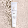 Innersense Organic Beauty Hydrating Hair Mask 4 oz - product shown in sand and water.