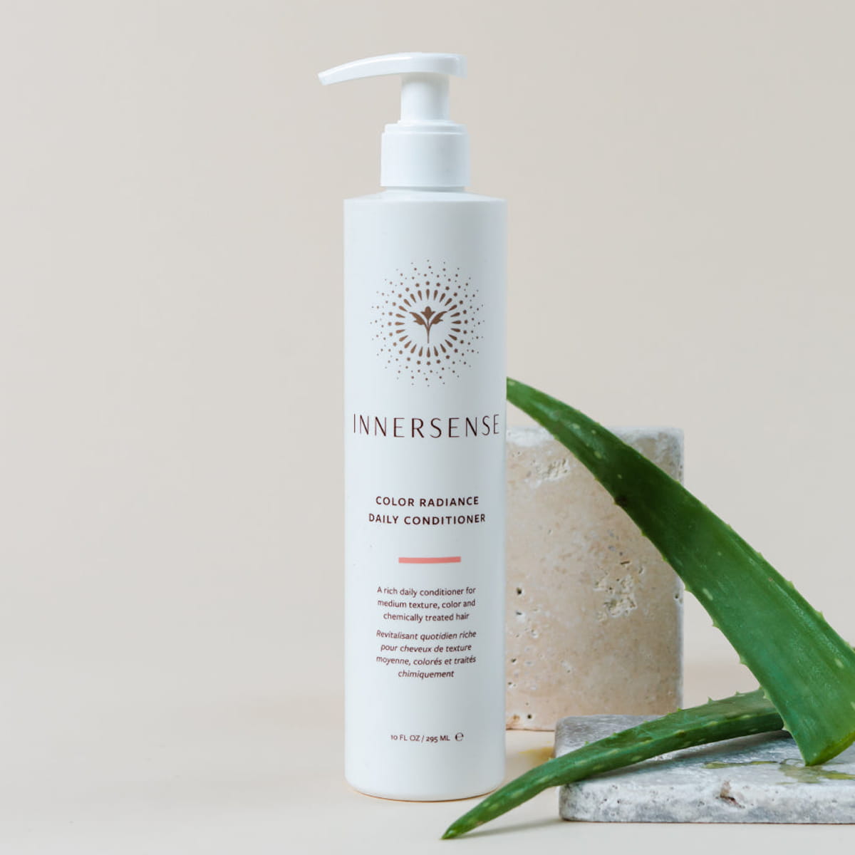 Innersense Organic Beauty Color Radiance Daily Conditioner 10 oz - product shown on creme background. 