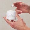 Innersense Organic Beauty Inner Peace Whipped Creme Texturizer (3.4 oz) - product shown being used by model. 