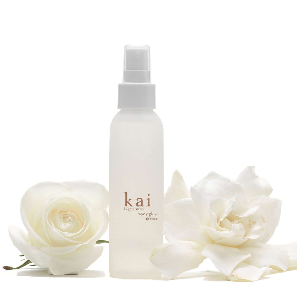 Kai Fragrance Rose Body Glow (4 oz) with two white roses on a white background