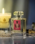 Lifestyle shot of Carthusia Tuberosa Eau de Parfum (100 ml) with candle burning in the background