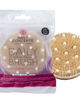 Daily Concepts Daily Detox Massaging Brush showing brush outside with packaging