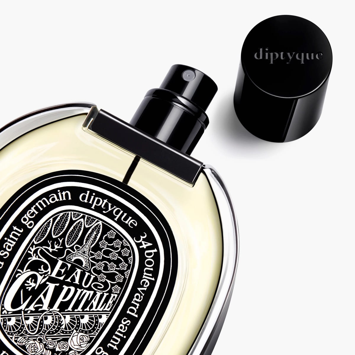 Diptyque Eau Capitale Eau de Parfum (75 ml) - product shown with lid off. 
