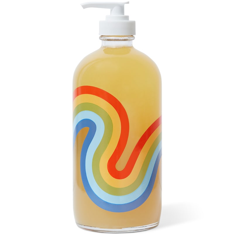 Back side of bottle of Bathing Culture Refillable Rainbow Glass Mind and Body Wash in Cathedral Grove (16 oz)