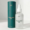Mother Mother Magnesium Oil (4 oz) - product show next to packaging. 