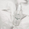 Mother Mother Magnesium Oil (4 oz) - product shown on white sheet. 