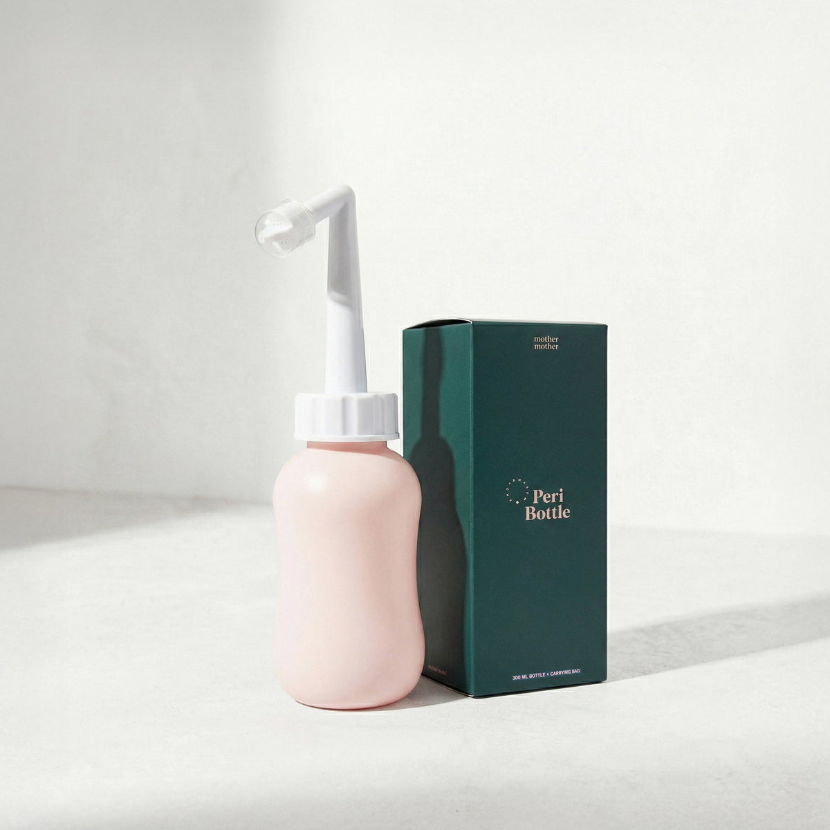Mother Mother Peri Bottle (1 pc) Pink - product shown next to packaging. 