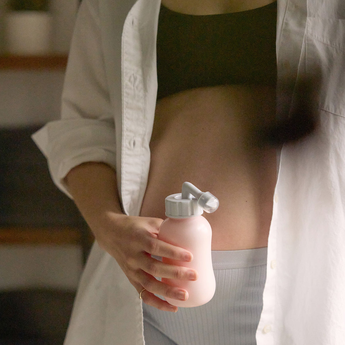 Mother Mother Peri Bottle (1 pc) Pink - product shown being held by model. 