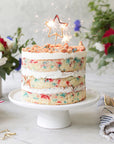 TOPS Malibu Big Golden Sparkler Wand Star - sparkler on top of cake