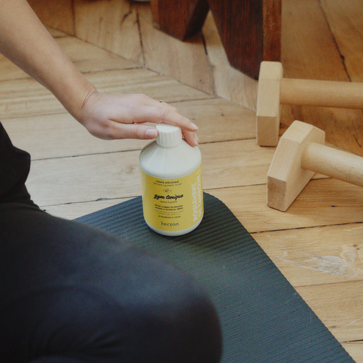 Kerzon Laundry Soap - Gym Tonique (500 ml) - product shown on yoga mat. 
