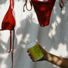 Kerzon Laundry Soap - Gym Tonique (500 ml) - product shown under red bikini. 