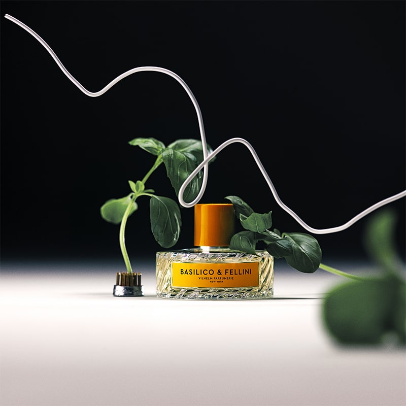 Vilhelm Parfumerie Basilico & Fellini Eau de Parfum - product shown with plants and wire