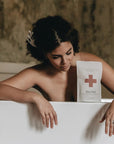 Pursoma Hot Tub - Model shown in bath tub with product