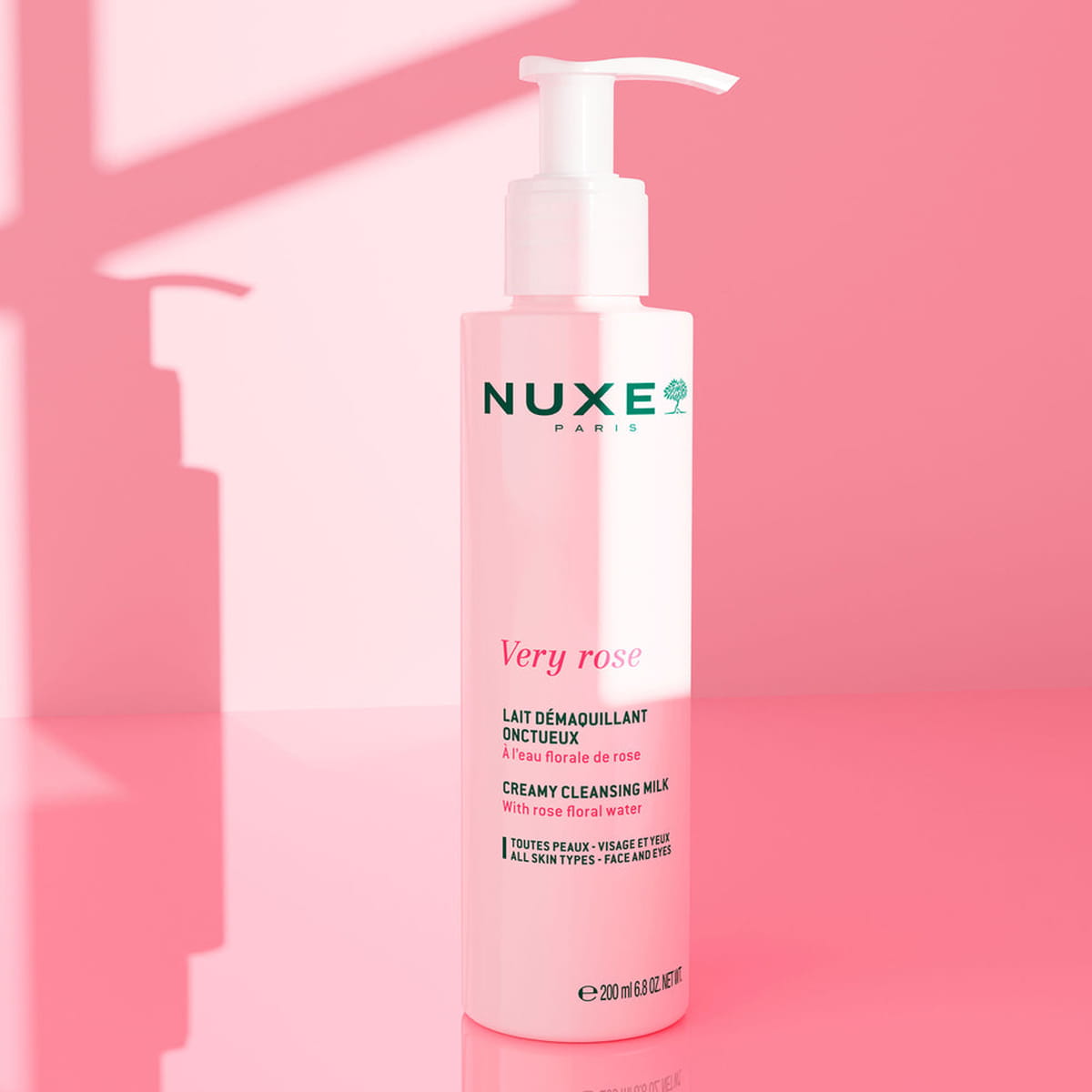 Nuxe Very Rose Make-up Remover Milk (200 ml) - product shown on pink background. 