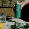 Kerzon Dishwashing Liquid - Fleurs de Romarin (500 ml) - product shown being held. 