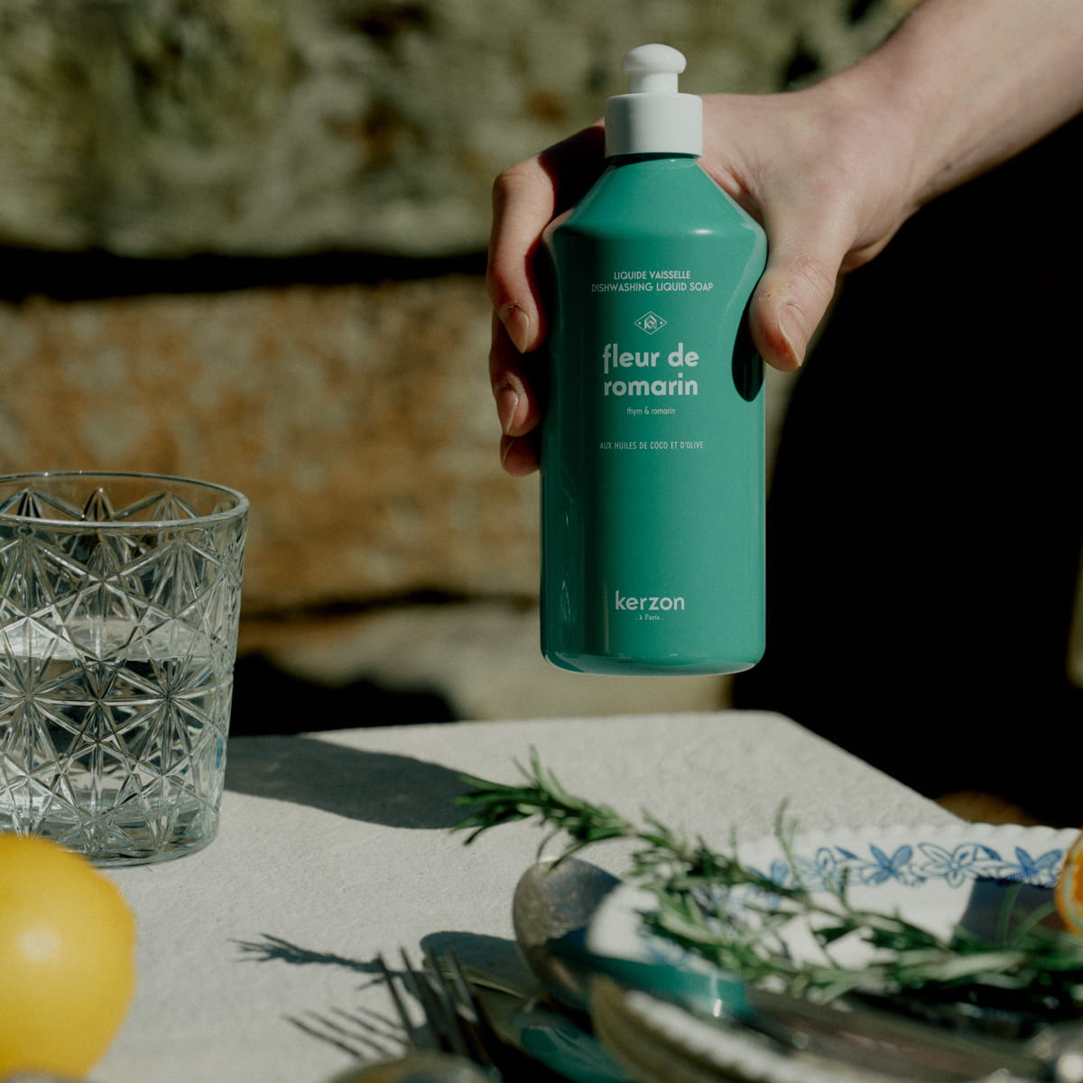 Kerzon Dishwashing Liquid - Fleurs de Romarin (500 ml) - product shown being held. 
