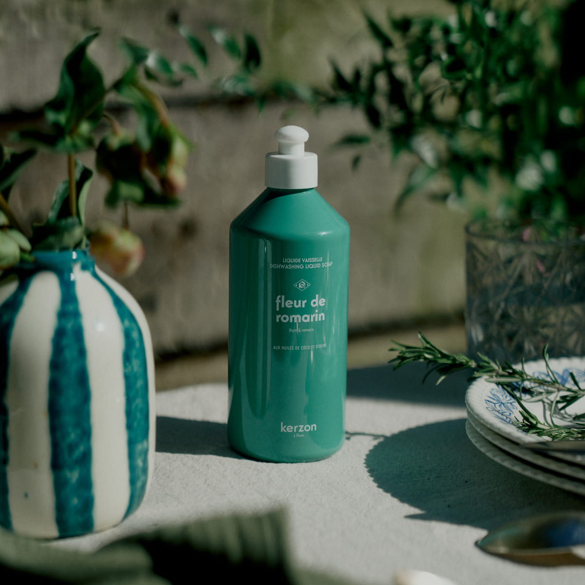 Kerzon Dishwashing Liquid - Fleurs de Romarin (500 ml) - product shown on table. 