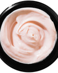 Top view of Odacite Creme de la Nuit (50 ml) with lid off to show color and texture of cream