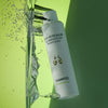 Lifestyle shot of Eau d'Italie Shampoo (200 ml) under water